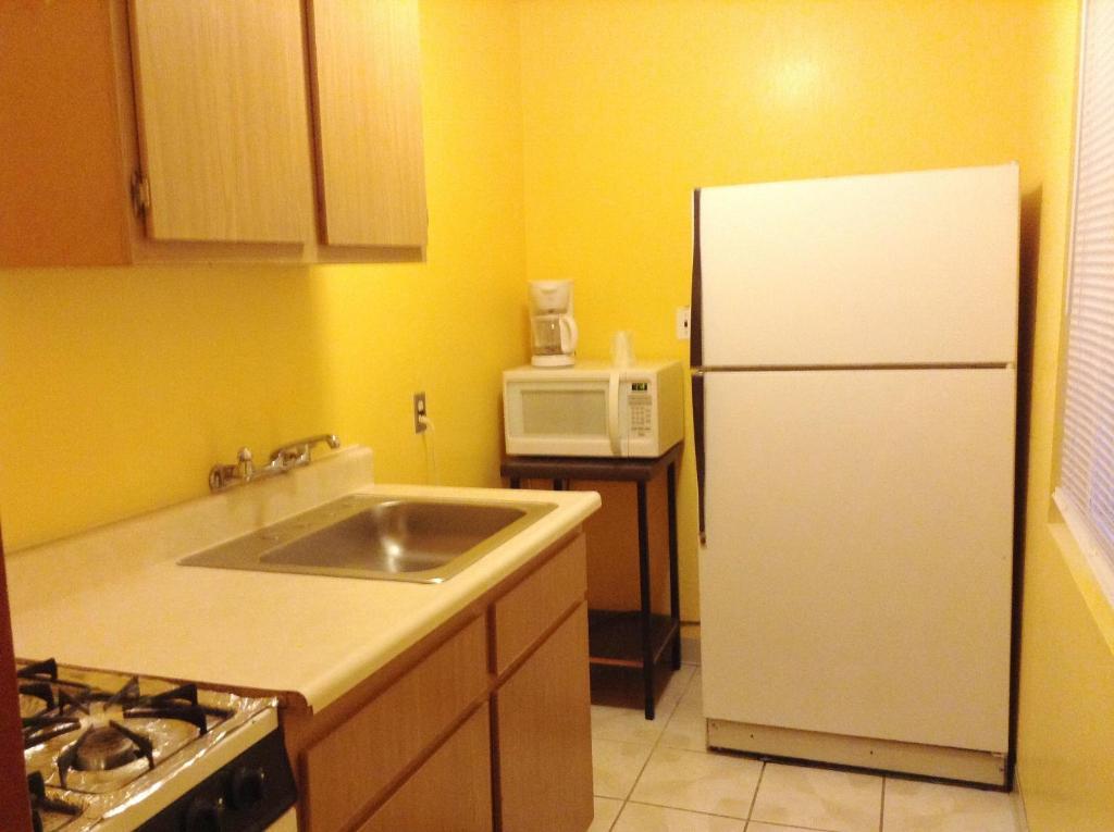 Oceanside Inn & Suites Habitación foto