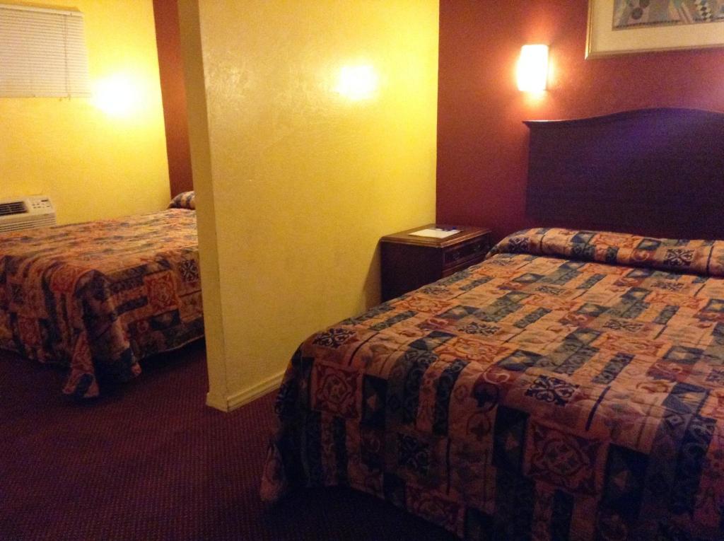 Oceanside Inn & Suites Habitación foto
